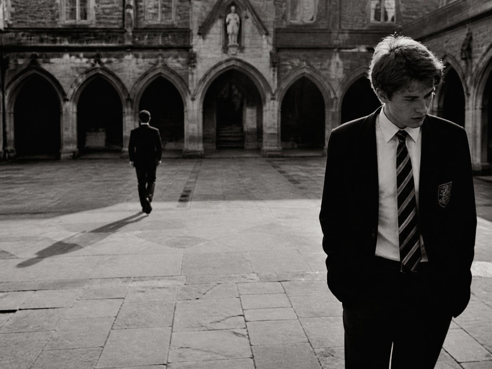 Archival photograph of the school courtyard and chapel arches